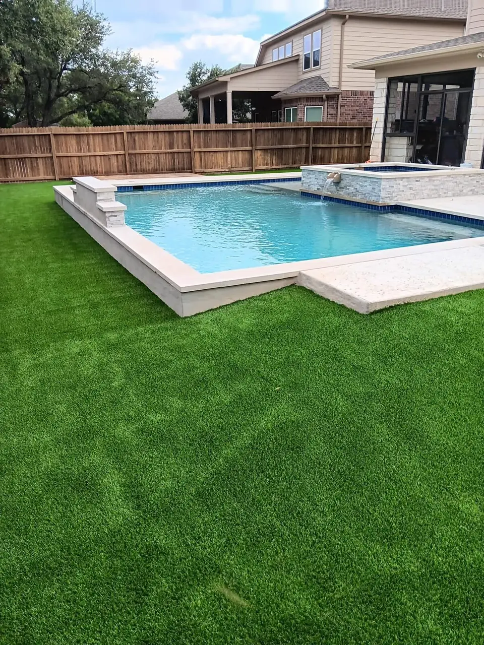 Artificial turf pool surround in San Antonio